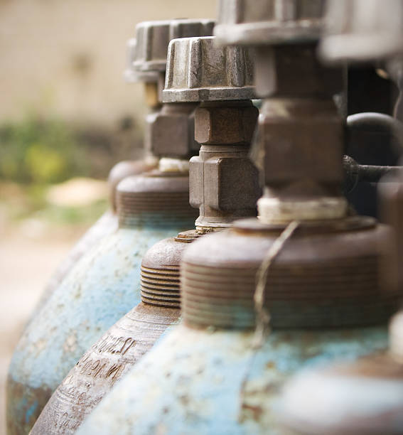 Close-up of blue gas cylinders stock photo