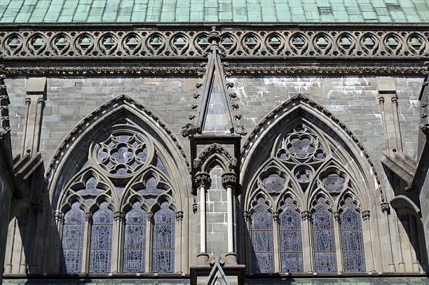 Cathedral walls Southern side of the Nidaros Cathedral, Trondheim, Norway gargoyl stock pictures, royalty-free photos & images