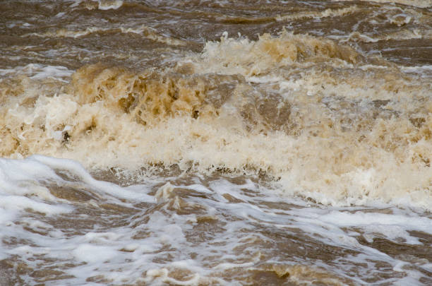 istock Turbid flood waters flow over rapids after heavy rains 930704682