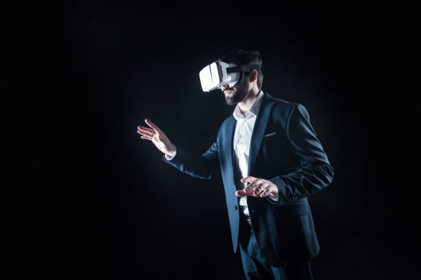 istock Smart confident businessman wearing 3d glasses 930705186