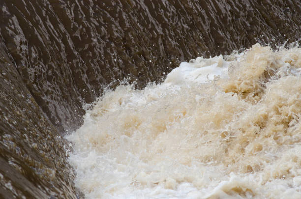 istock Turbid flood waters flow over a weir after heavy rains 930705520