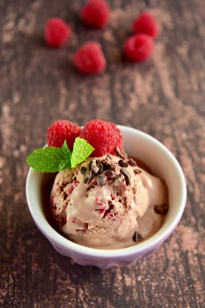 Raspberry chocolate ice cream with cacao nibs