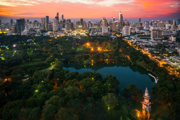istock Lumpini park and Bangkok city with sunset sky 930719404