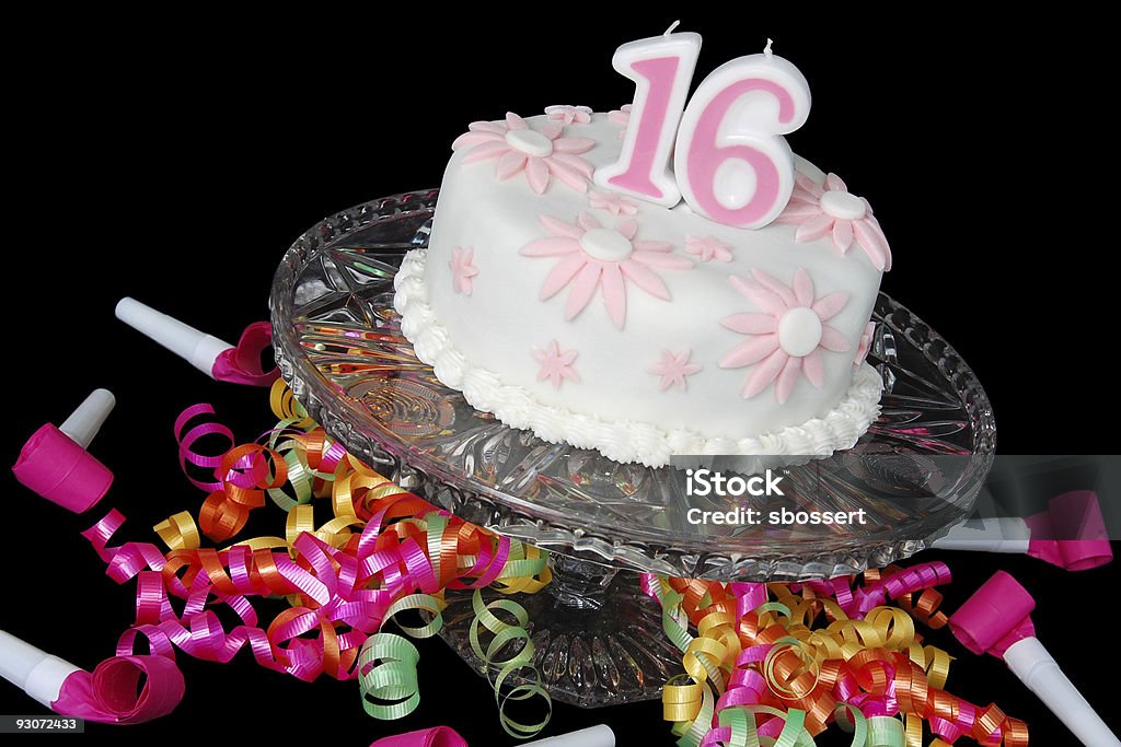 Sweet Sixteen Cake A "Sweet Sixteen" birthday cake decorated with pink and white fondant daisies. Anniversary Stock Photo