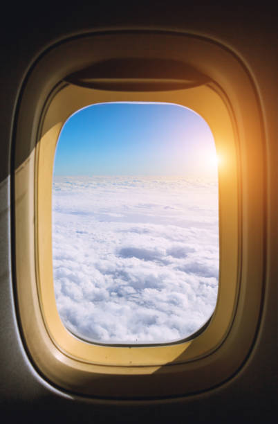 istock View from the window plane on amazing sky with scenic clouds at the sunset. 930725880