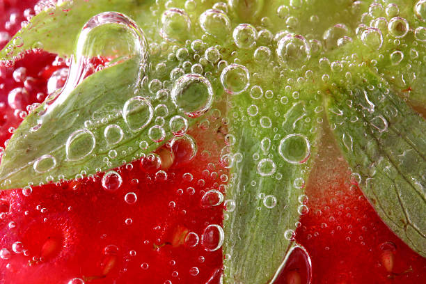 istock Macro of strawberry in water 93072595