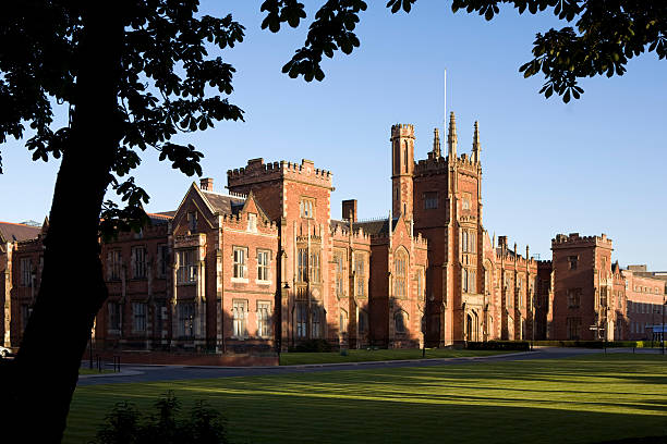 istock Red brick building at Queens University Belfast and blue sky 93072851