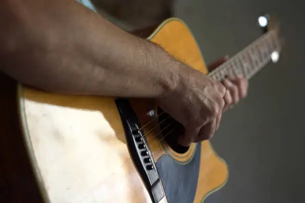 Photo of playing the guitar