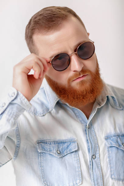 istock beard man in sunglasses and denim shirt 930737380