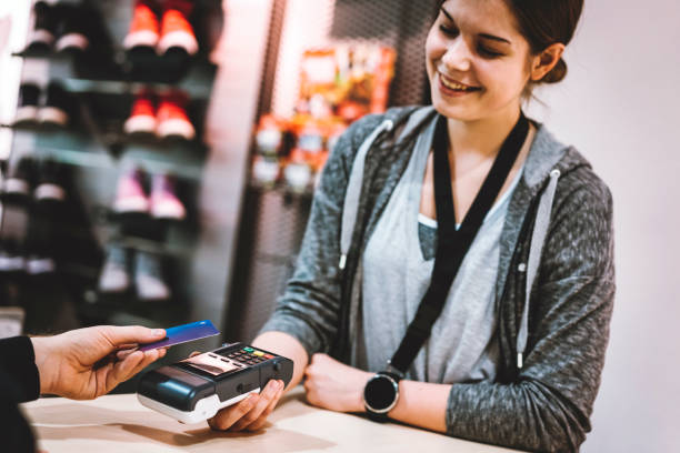istock Customer paying for their order with a credit card 930740210
