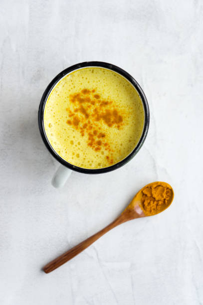 istock Turmeric latte, Golden milk. Vertical photo. 930741302