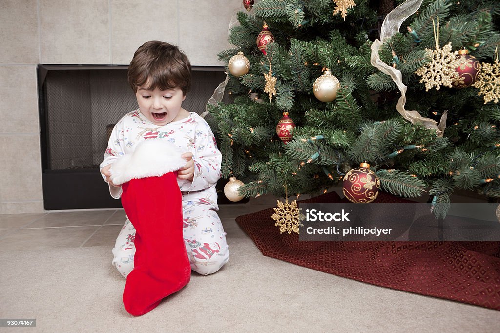 Junge mit Weihnachtsstrumpf - Lizenzfrei Weihnachtsstrumpf Stock-Foto