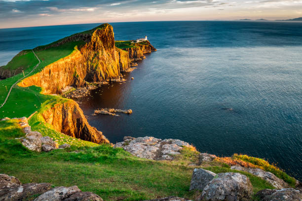 istock The Neist point lighthouse at dusk, Scotland, UK 930750878