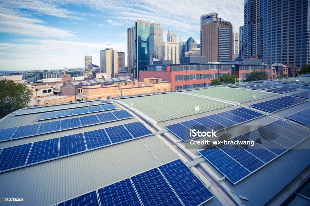 Sydney, City Architecture and Photovoltaic Panels Sydney, Australia, City Skyline and Solar Panel Combination Business Stock Photo