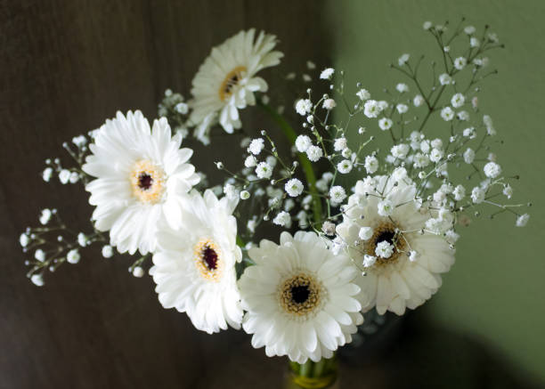 istock white flowers in vase , blurred selective focus 930758466