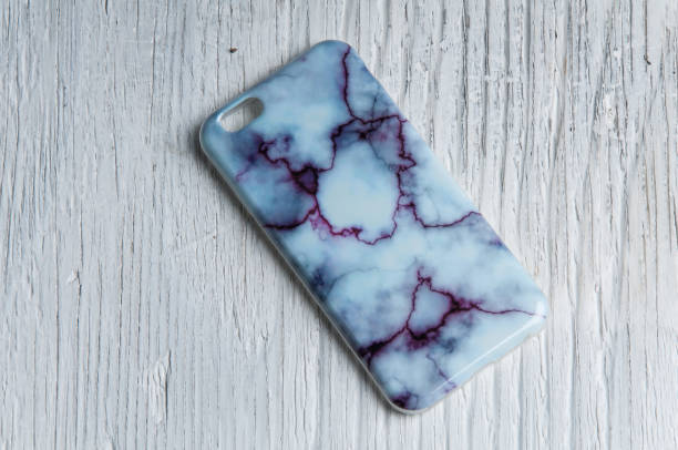 istock Mobile phone cover on vintage wooden background 930762258