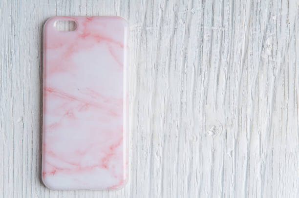 istock Mobile phone cover on vintage wooden background and copy space 930762318