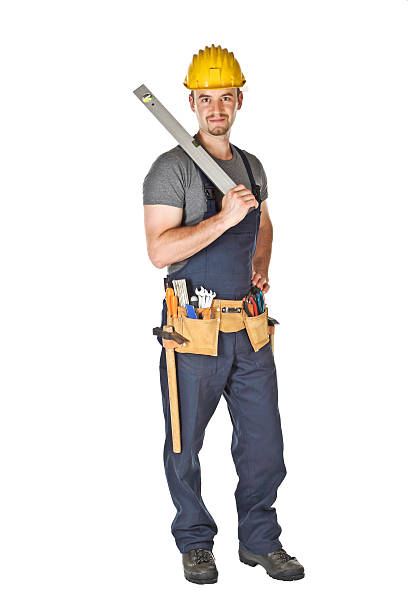 istock handyman holding spirit level 93076485