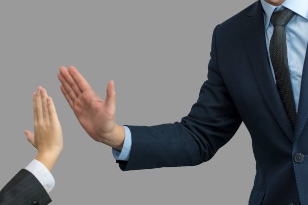istock father and son in formal wear giving high five 930764894