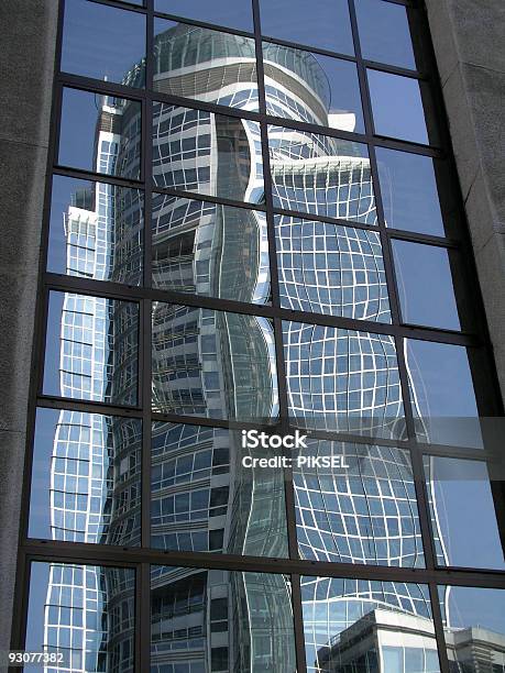 Building Reflected In Skyscraper Windows Stock Photo - Download Image Now - Architecture, Backgrounds, Blue