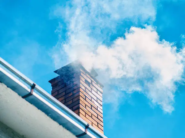 Damaged chimney under fumes