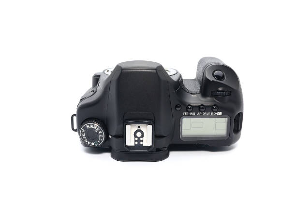 istock Large black color professional digital single-lens reflex camera DSRL body, Front and Top Side, Front View, white background image 2 930789662