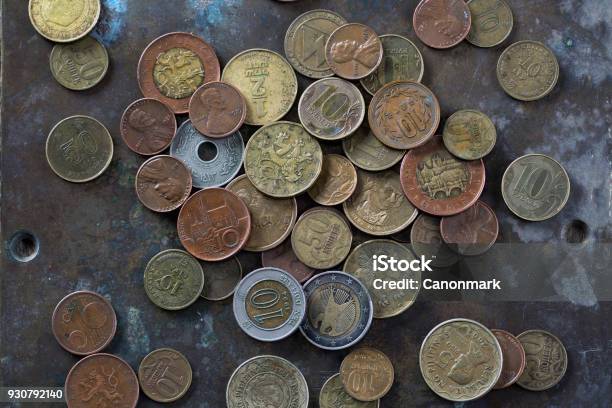 A Bunch Of Various Coins On A Copper Plate Stock Photo - Download Image Now - Banking, Bunch, Business