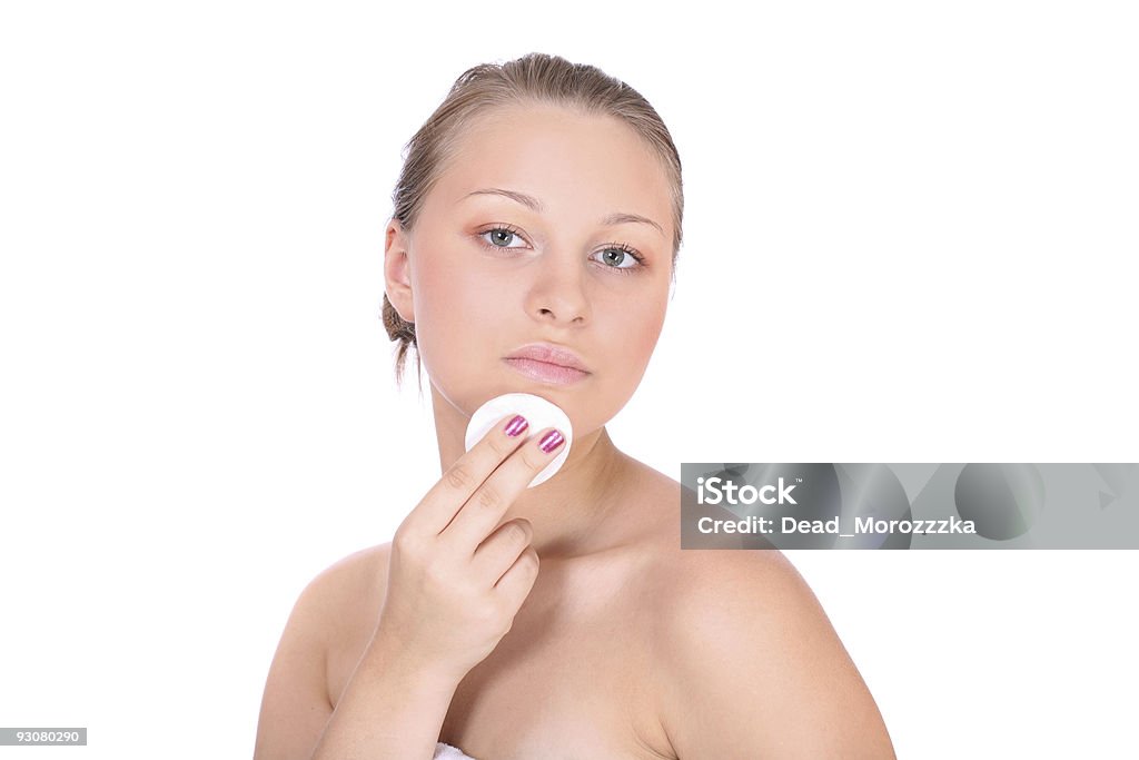 Hermosa mujer joven teniendo cuidado de la cara - Foto de stock de Adulto libre de derechos