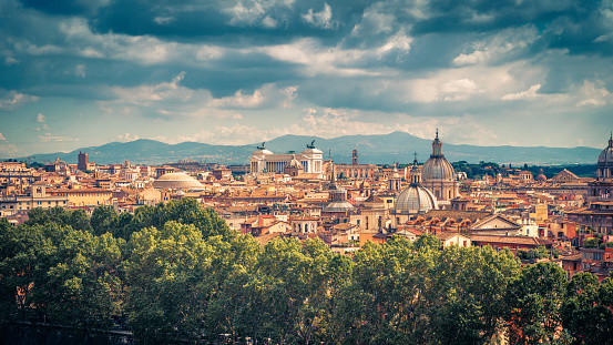 Aerial panoramic view of Rome in summer, Italy. Rome skyline. Old Rome in the sunlight. Beautiful scenic panorama of Rome on a sunny day. Vintage photo.