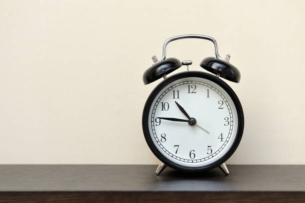istock Classic black alarm clock in the home 930805210