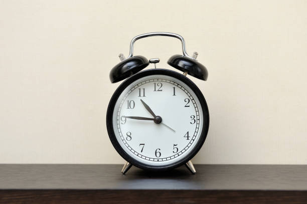 istock Classic black alarm clock in the home 930805384