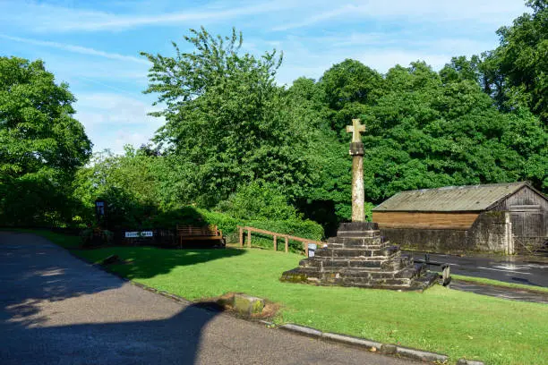The Linby village green and stone-cross war memorial in the county of Nottinghamshire.