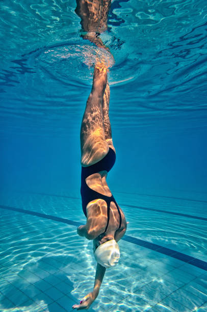 istock Woman Swimming In Pool 930820256