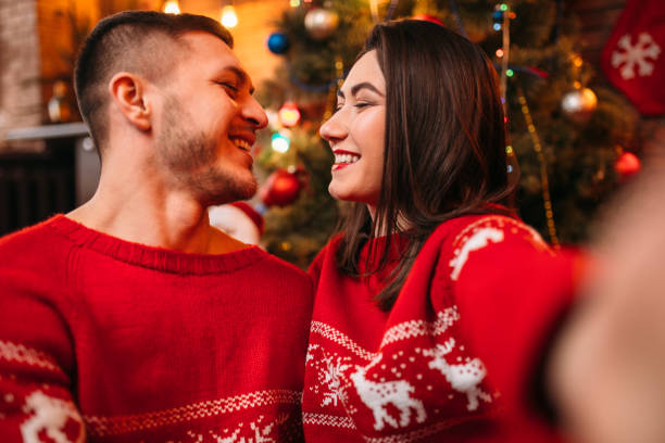 istock Love couple makes selfie, Christmas celebration 930820270
