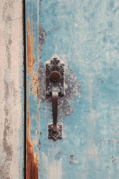 istock Vintage style door and doorknob 930824320