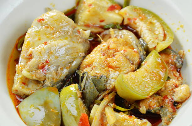 istock spicy fried catfish with curry and eggplant 930828286