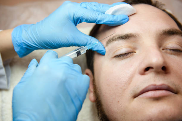 istock Doctor aesthetician makes beauty injections 930829096