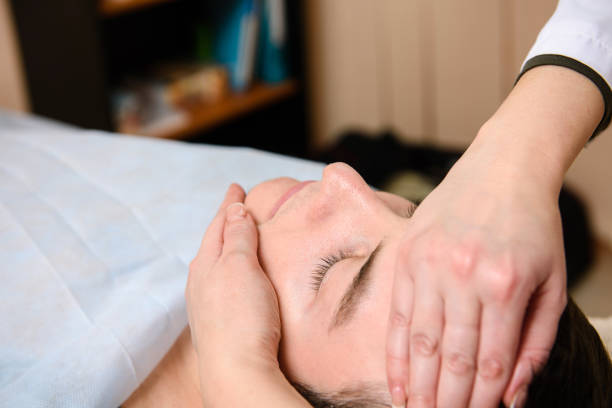 istock Doctor massages the face to the patient 930829580