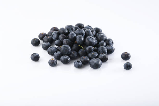 istock Fruit: Close up of Fresh Blueberries Isolated on White Background 930835938