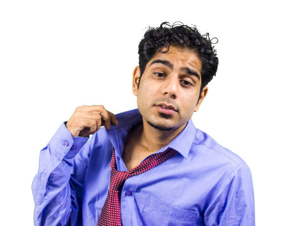 Businessman loosening his tie