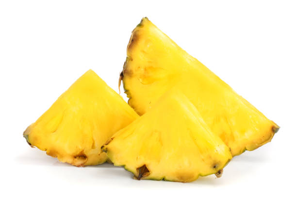 istock pineapple slices isolated on white background close-up 930848732
