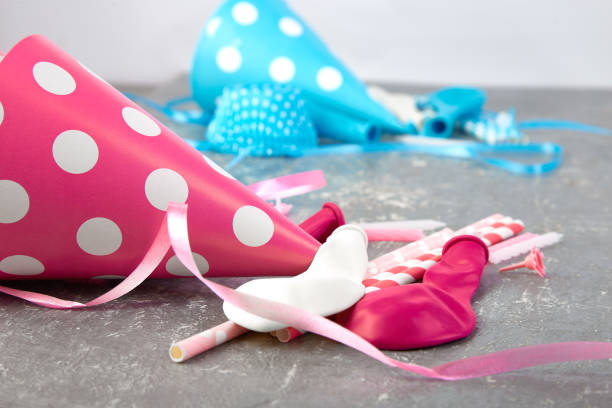 istock Party pink and blue paper hat. 930848780