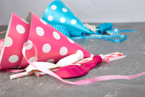 istock Party pink and blue paper hat. 930848784