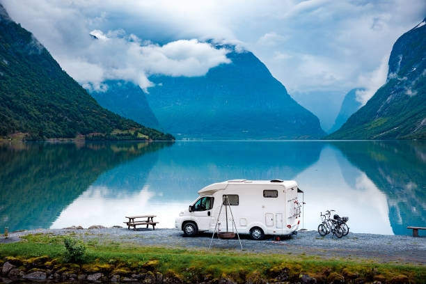 Family vacation travel RV, holiday trip in motorhome Family vacation travel RV, holiday trip in motorhome, Caravan car Vacation. Beautiful Nature Norway natural landscape. northern europe family car stock pictures, royalty-free photos & images