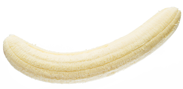 Peeled banana on the white background.