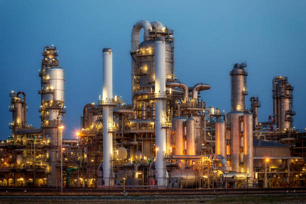 istock Oil refinery plant at night 930857476