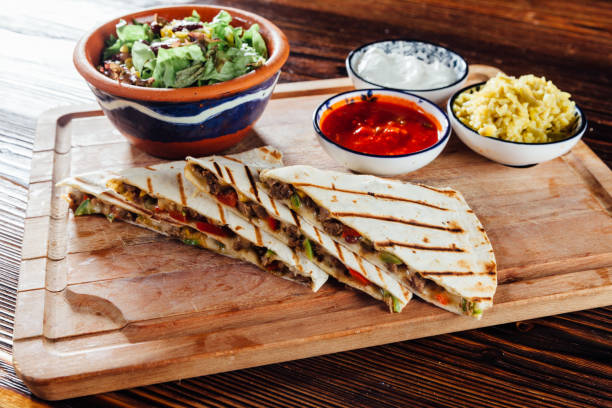 istock Quesadilla with salad and sauce 930857594