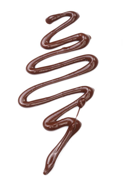 istock sweet chocolate sauce isolated on a white background 930861560