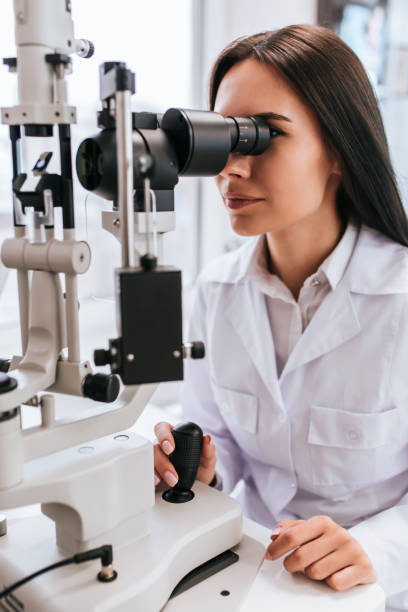 istock Female doctor in ophthalmology clinic 930864200