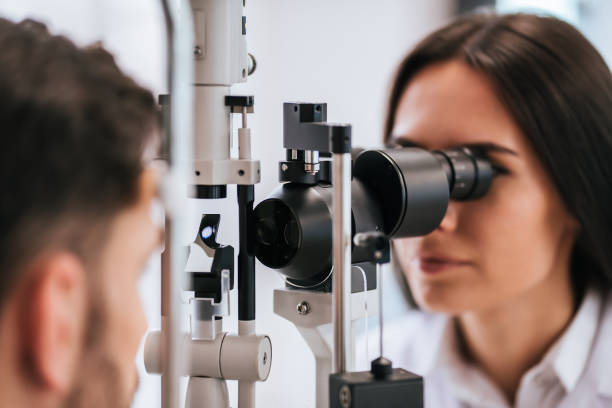 istock Doctor and patient in ophthalmology clinic 930864238